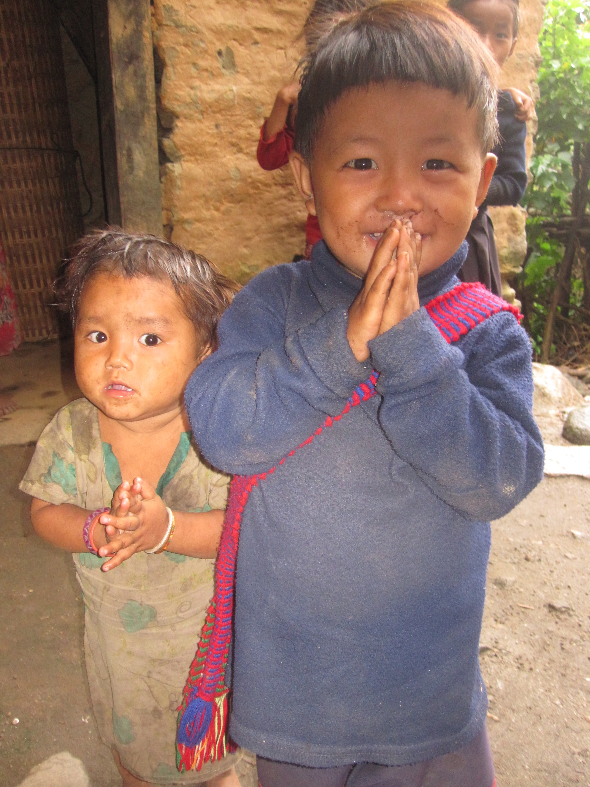 Children greeting us with a Namaste
